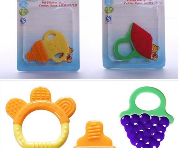 Bé teether mol nhai đồ chơi bé Manhattan tay bắt bóng rầm rầm không độc silicon mềm 3-12 tháng - Gutta-percha / Toothbrsuh / Kem đánh răng túi nhai ăn dặm của nhật