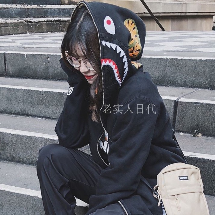 bape shark hoodie on person