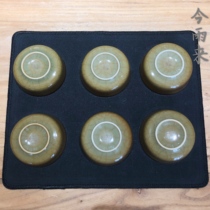 Equal to the green porcelain cup