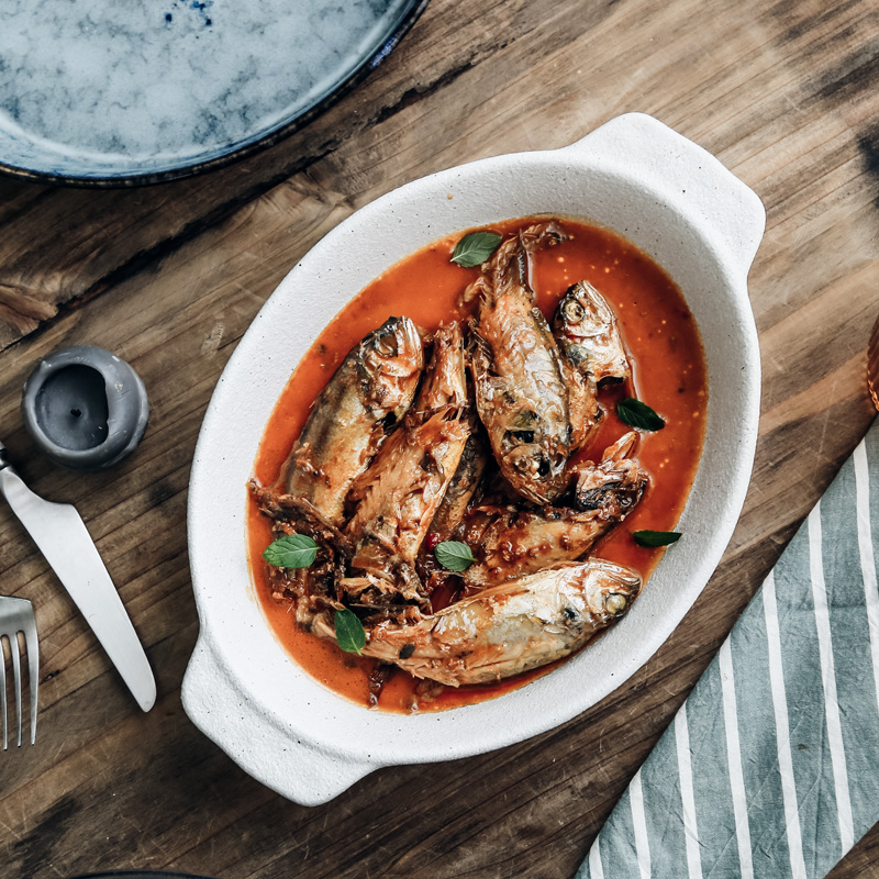 Creative ceramic oval baking tray Home baking dish Cheese baked rice tray Microwave oven special double ear plate