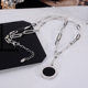 European and American versatile black and white shell round necklace female Internet celebrity long titanium steel sweater chain clothes pendant trendy accessories