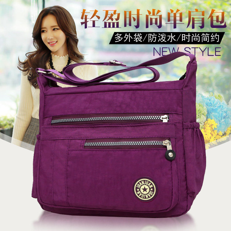 New large-capacity travel canvas bag female nylon cloth bag bag Oxford waterproof leisure slope bag Mom