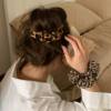 Trendy Leopard Print Scrunchie for Low Ponytail, Millennial Style Hair Accessory with a High-End Feel