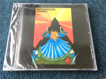 The OM version is unopened and the Mountain Climbing box is cracked