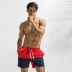 Tác động trực quan Mùa hè khâu màu quần nam bãi biển Quần short spa màu kích thước lớn - Quần bãi biển 	quần đi biển tập thể Quần bãi biển