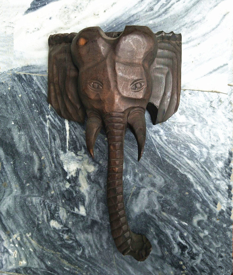Wood carving Hand carving Tunbao cultural decoration collection Face mask Nuo face hand hanging elephant trunk 40*25