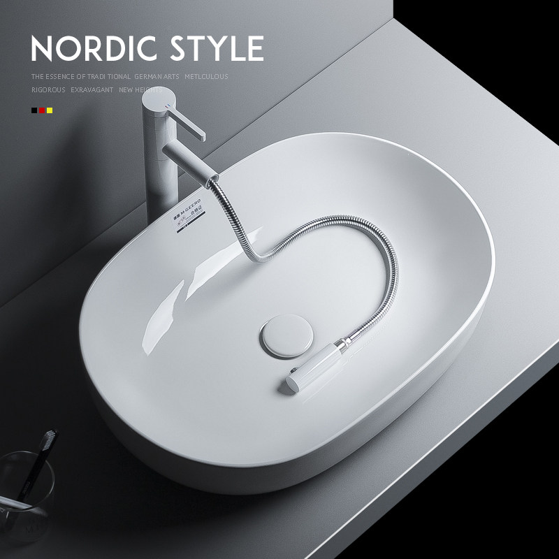 Simple countertop basin oval washbasin ceramic washbasin toilet wash basin large art countertop basin