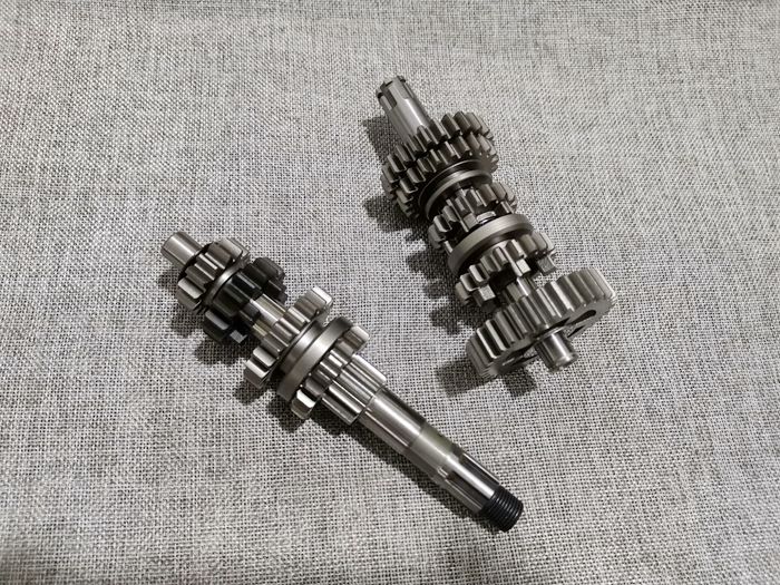Thích hợp cho phụ kiện xe máy Qingqi Suzuki Trục chính và phụ xe máy Shift gear QS125-5G trục chính và phụ - Xe máy Gears 	nhông số xe máy