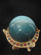 Fully gilt base inlaid with multiple baby stone balls