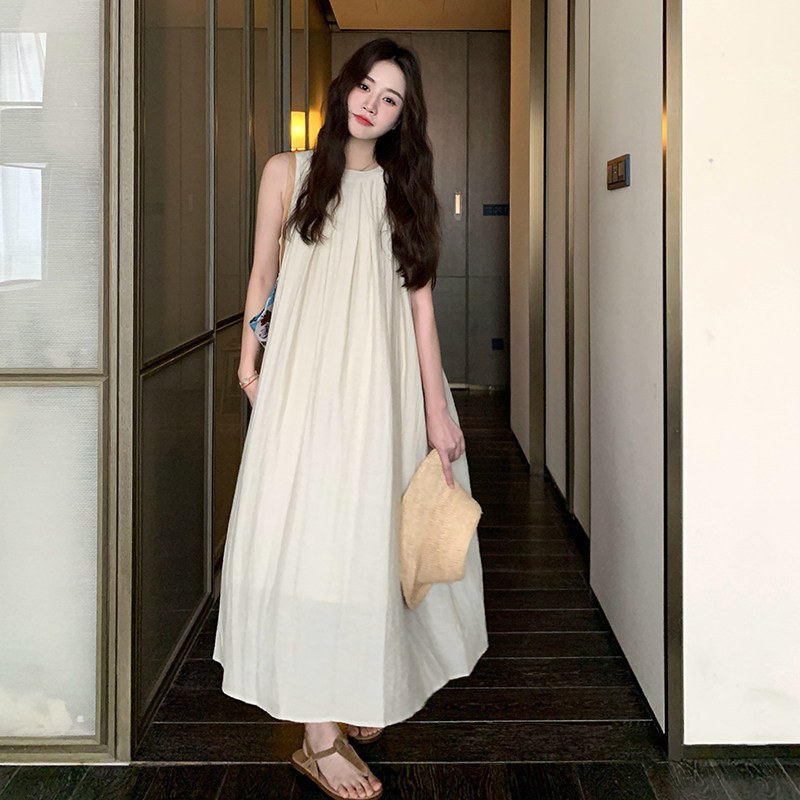 杏黄色无袖挂脖连衣裙女夏季2025新款法式温柔显瘦海边度假风长裙图片
