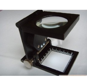 Tenfold folding magnifying glass