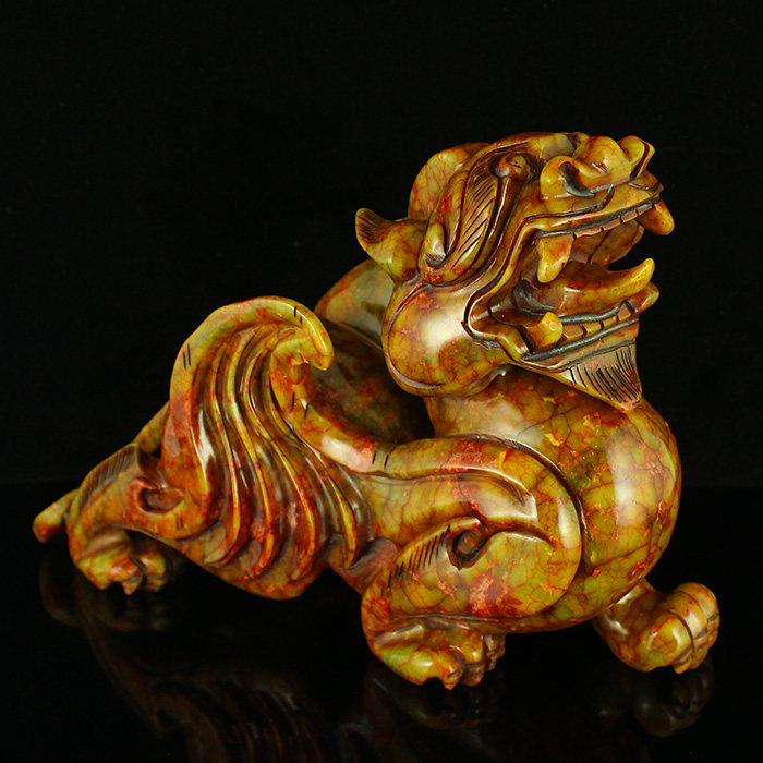 A price for a natural imitation of the ancient Xiu jade pendulum. 