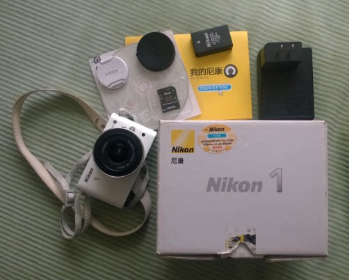 80% ຂອງກ້ອງ Nikon J1 mirrorless ມາມາດຕະຖານທີ່ມີເລນ 10-30MM