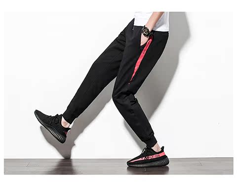 Quần thể thao mùa thu nam INS lỏng phiên bản Hàn Quốc của Harlan xu hướng hoang dã kín miệng giản dị quần ống chân quần nam quần bò nam