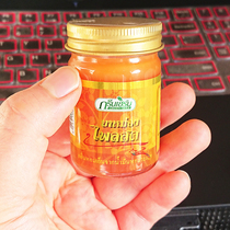 A bottle of Thai original new version of green herb large bottle of grass turmeric cream turmeric lemon flavor 50g