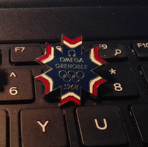 2010 Vancouver Winter Olympics badge Omega badge 1968 France Conoble Winter Olympics snowflake badge