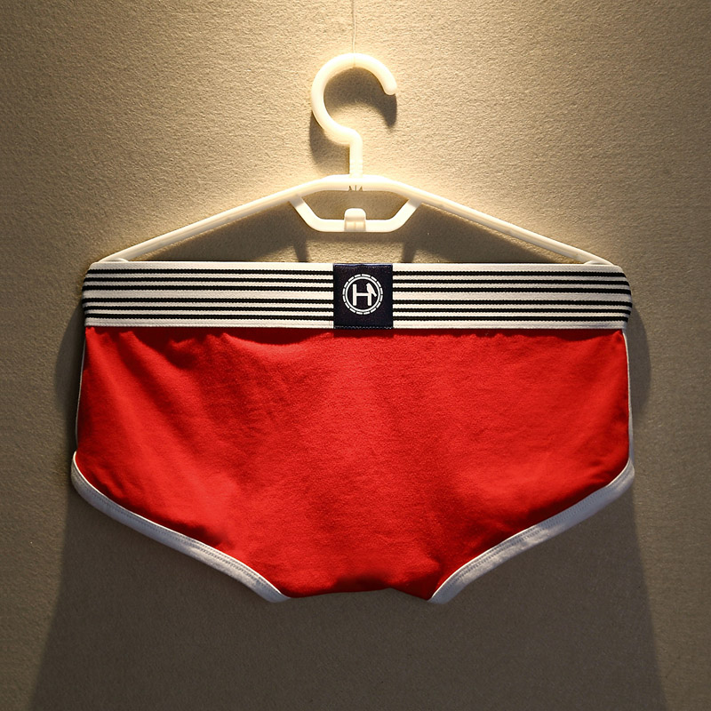 Đồ lót nam 2 chất liệu cotton nam boxer phiên bản Hàn Quốc màu rắn U lồi thủy triều nam thể thao quần short đầu quan sip nam