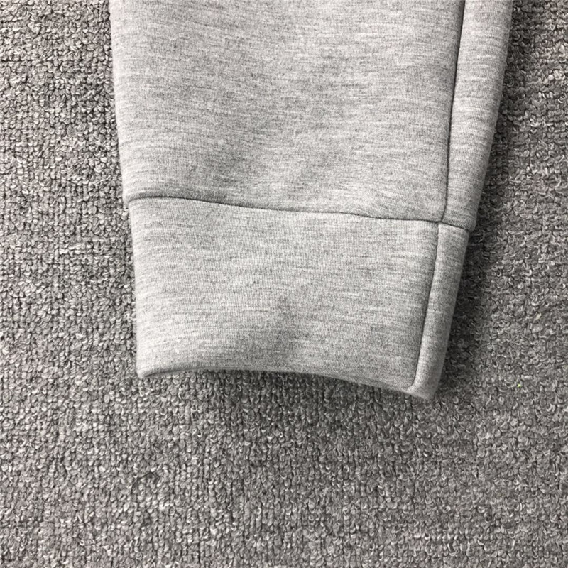 Fanzi Shangpin Đảo xuất khẩu Quốc gia U Không gian nhà Vải Cotton Màu rắn nhiều màu Không thấm nước Zipper nam Chân co lại quần jean nam rách
