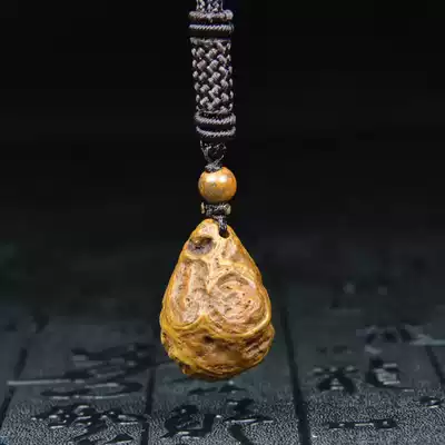 Nine-eyed stone shale Tibetan genuine Tianzhu rough stone Eye Lezi strong energy field Evil Buddha bead Pendant Pendant