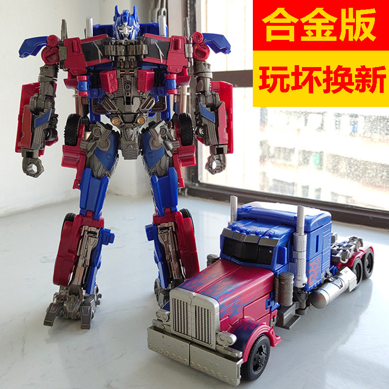 Transformed toy alloy genuine bumblebee dinosaur robot King Kong boy car cake ornaments ‮ Optimus Prime