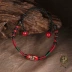 Loulan Inn retro vòng chân dân tộc ban đầu dệt tay trang trí màu đỏ thủy tinh chân trang trí chuỗi chân nữ hoang dã