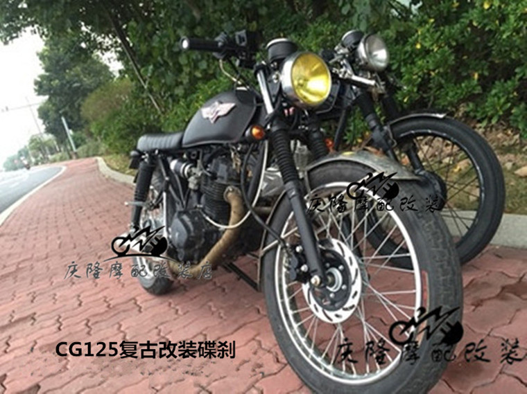 CG125 Gia Lăng 70 xe máy retro sửa đổi bánh xe mở rộng bánh xe bánh xe phía trước disc brake kit phanh dầu sửa đổi giá bánh xe vision
