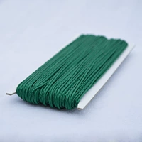 Темно -зеленая проволока пряжки