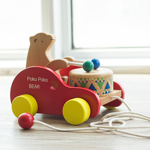 Export Japan Early Teaching Step Drag Toys Children Puzzle Pull Wire Pulls Beech small Bear Knocks the drum cheerleading