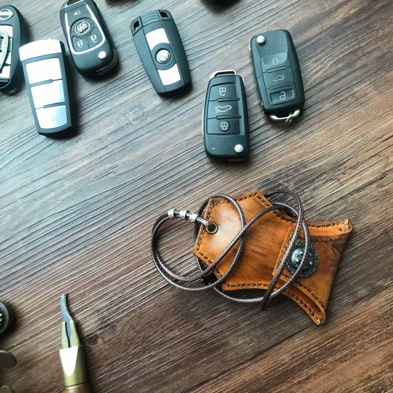 Lớp đầu tiên của túi da khóa cho nam và nữ chìa khóa xe ô tô đặt chìa khóa xe treo vòng cổ - Trường hợp chính ví đựng móc khóa