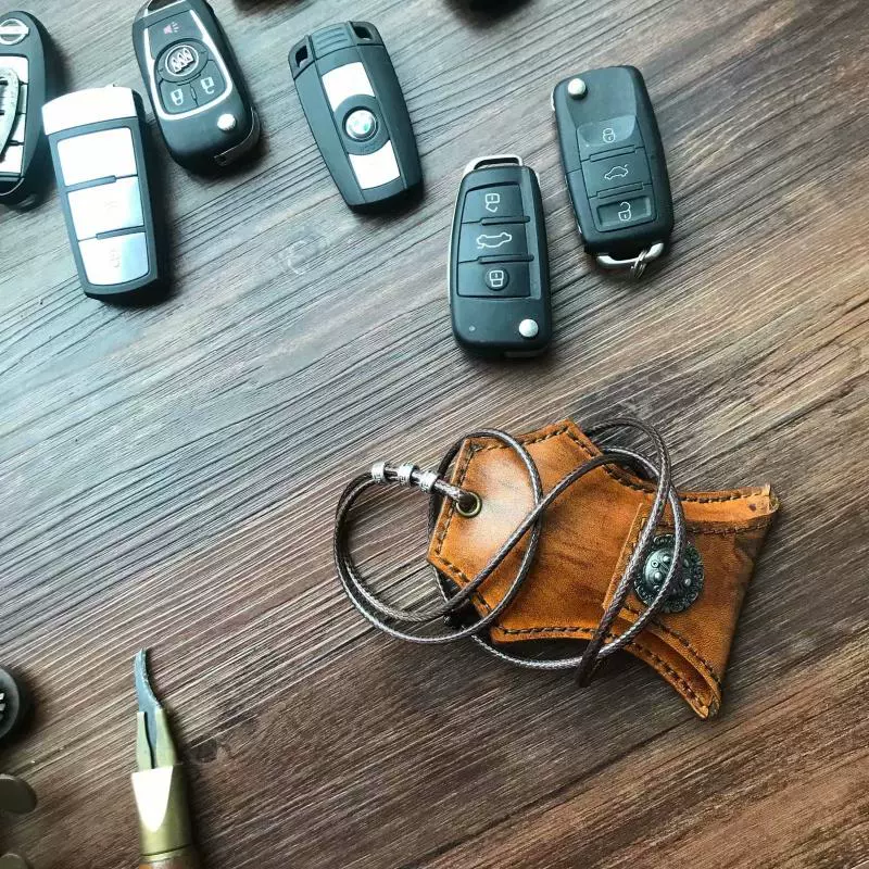 Lớp đầu tiên của túi da khóa cho nam và nữ chìa khóa xe ô tô đặt chìa khóa xe treo vòng cổ - Trường hợp chính