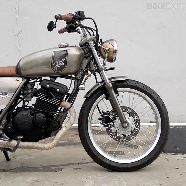 Fever phiên bản Suzuki GN125GS125EN125GX125 khoan da báo Suzuki Wang nói dây bánh trước lắp ráp trung tâm - Vành xe máy bánh xe airblade