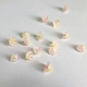 10 градиентных розовых и желтых цветов ландыша