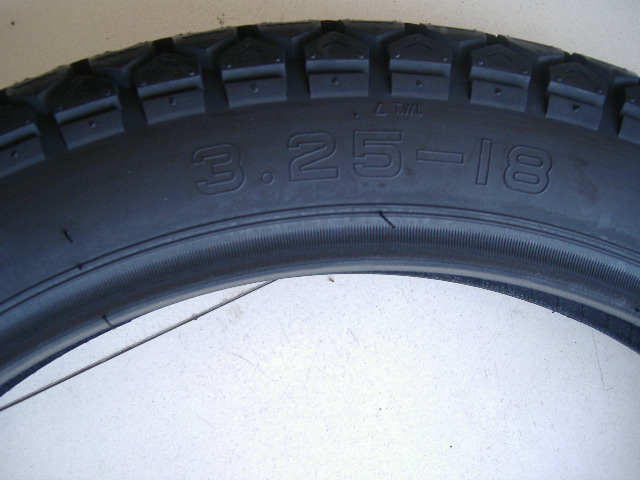 Lốp xe máy Zhengxin lốp xe máy 3.25-18 xuyên quốc gia chống trượt lốp xe da báo đặc biệt lốp xe máy bám đường