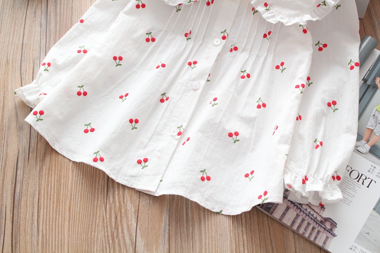 Mùa thu 2018 bé gái mặc áo sơ mi trắng cotton cotton dễ thương bên tai in áo sơ mi cherry trẻ em áo sơ mi trẻ em giá tốt