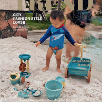 South Korean in childrens beach toy suit pull cart beach shovel digging sand and playing sand outdoor tool bucket