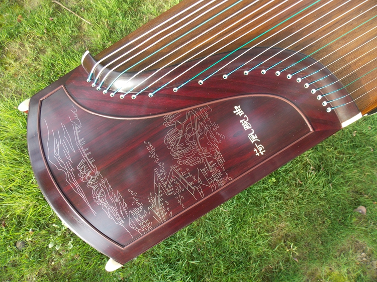 Dunhuang Guzheng 7698J Special selection of broadleaf yellow sandalwood Pinewood Pinebranches Recumbent of a factory Wind Hole Professional playing a factory