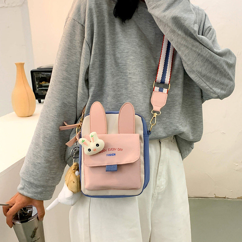 The new Korean version of the children's small bag net Red New Year girl bag fashion cute oblique cross bag for boys and girls canvas bag