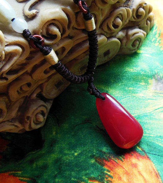 Xinjiang natural follow-shaped red wax stone pendant hanging decoration