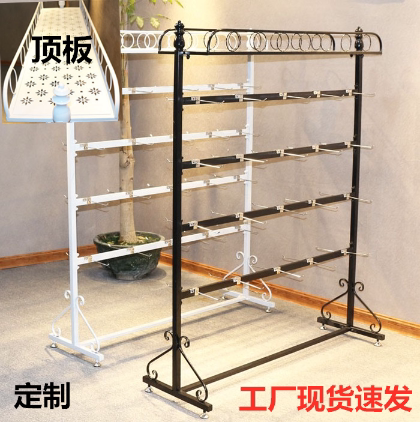 Wrought iron sock shelf display rack adjustable between layers Nakajima mobile phone shell jewelry pylons landing multi-function slipper rack