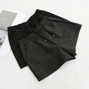Đàn hồi eo cao mùa thu và mùa đông hoang dã sọc dọc chất liệu len quần short nữ rộng chân rộng đã mỏng một từ bên ngoài mặc quần bốt