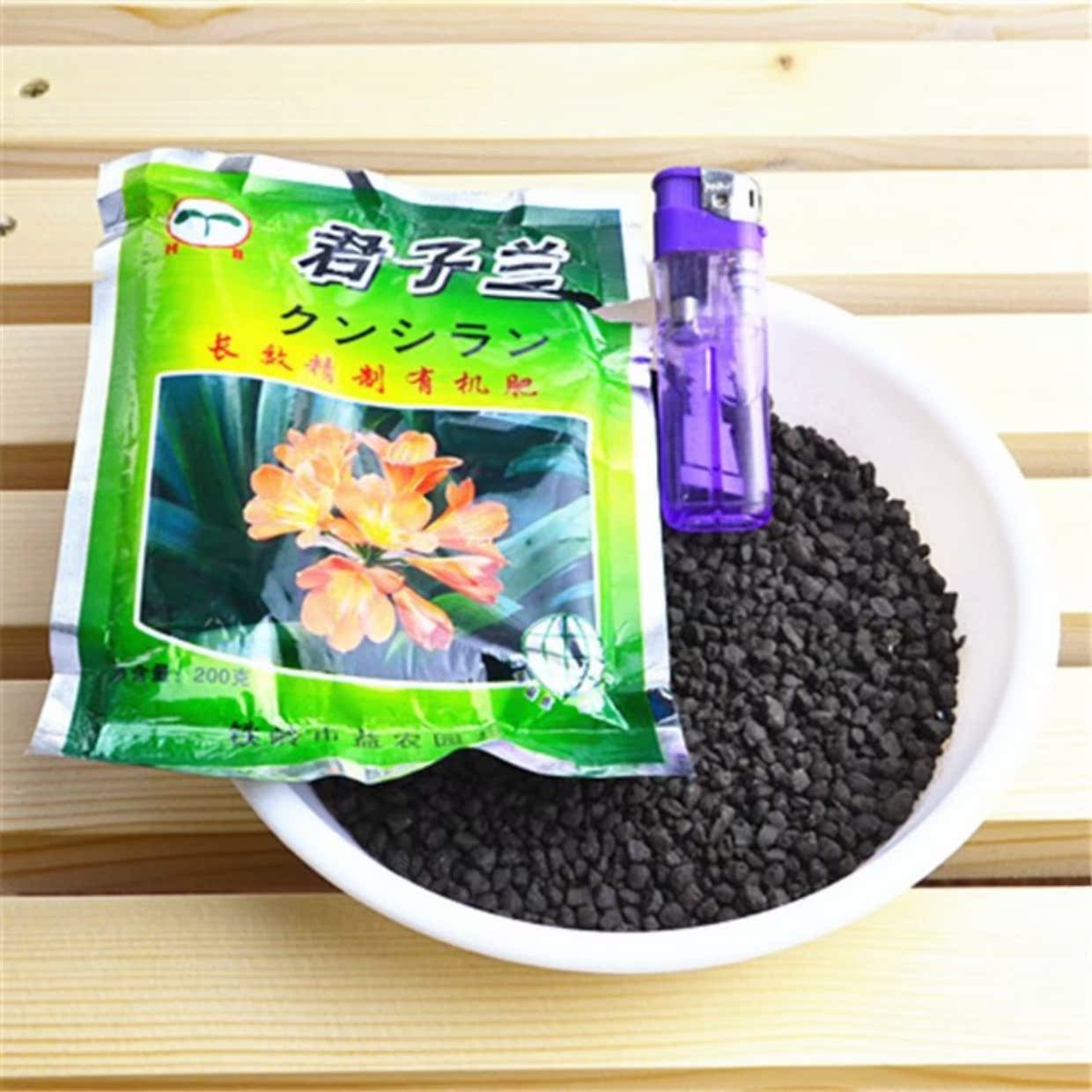Cung cấp làm vườn hạt phát hành chậm Clivia lá phong lan lớn Hổ Piran phân bón đặc biệt / cây lan phân bón hữu cơ chung bình xịt tưới cây