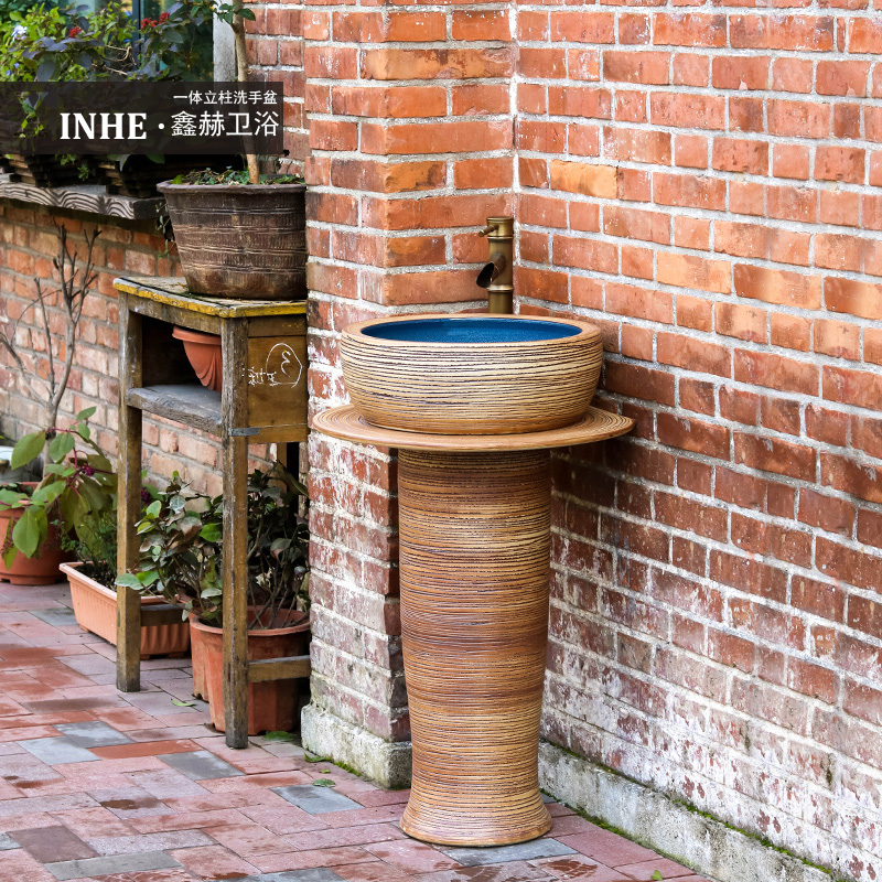 The sink ceramic basin of pillar type column landing stage basin integrated art balcony small bathroom toilet commode pool