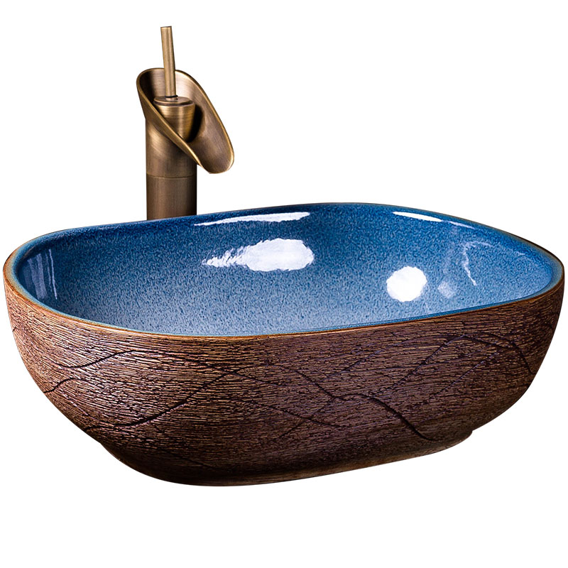 Ceramic sink on stage basin oval plate of the pool that wash a face Chinese creative household toilet bathroom art