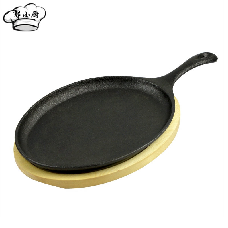 Cast iron oval pan frying pan household commercial steak pan teppanyaki breakfast pan uncoated non-stick wooden tray