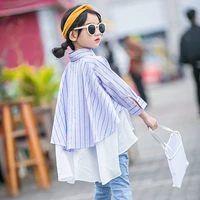 Áo sơ mi nữ mùa xuân 2019 phiên bản mới của Hàn Quốc của quần áo thủy triều trẻ em áo sọc nước ngoài không đều trong phần dài của mùa thu - Áo sơ mi shop trẻ em
