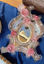 Deposit: 2999 for the full amount. A pink Murano beauty mirror.