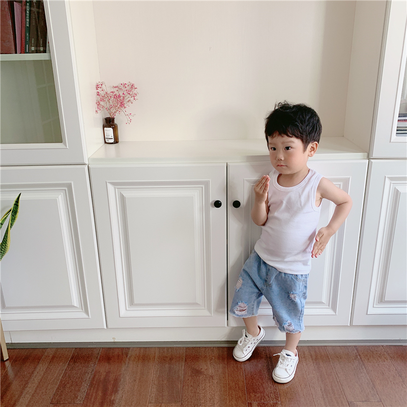 Thời trang phương Tây quần áo bé trai màu xanh nhạt lỗ cao bồi hoang dã 2019 hè nhỏ bé năm quần - Quần jean yếm bò cho bé gái