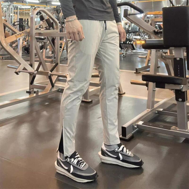 Spring and Summer Sports Quick-Drying Casual Pants Fitness Running Drawstring Versatile Long Pants Men's Slim Fit Pocket Zipper Pants Spring and Summer Sports Quick-Drying Casual Pants Fitness Running Drawstring Versatile Long Pants Men's Slim Fit Pocket Zipper Pants