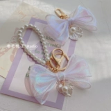 Оригинальный брелок с бантиком из жемчуга