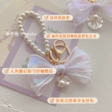 Оригинальный брелок с бантиком из жемчуга